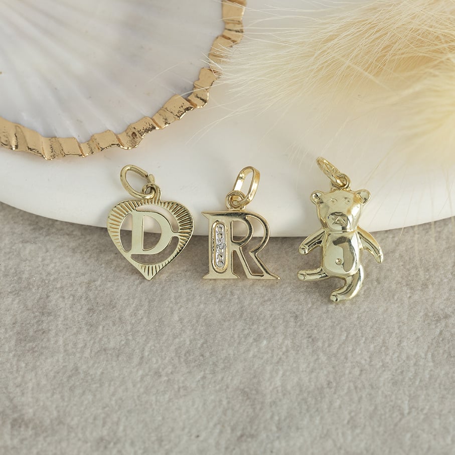 Gold pendant letter D 14 karat