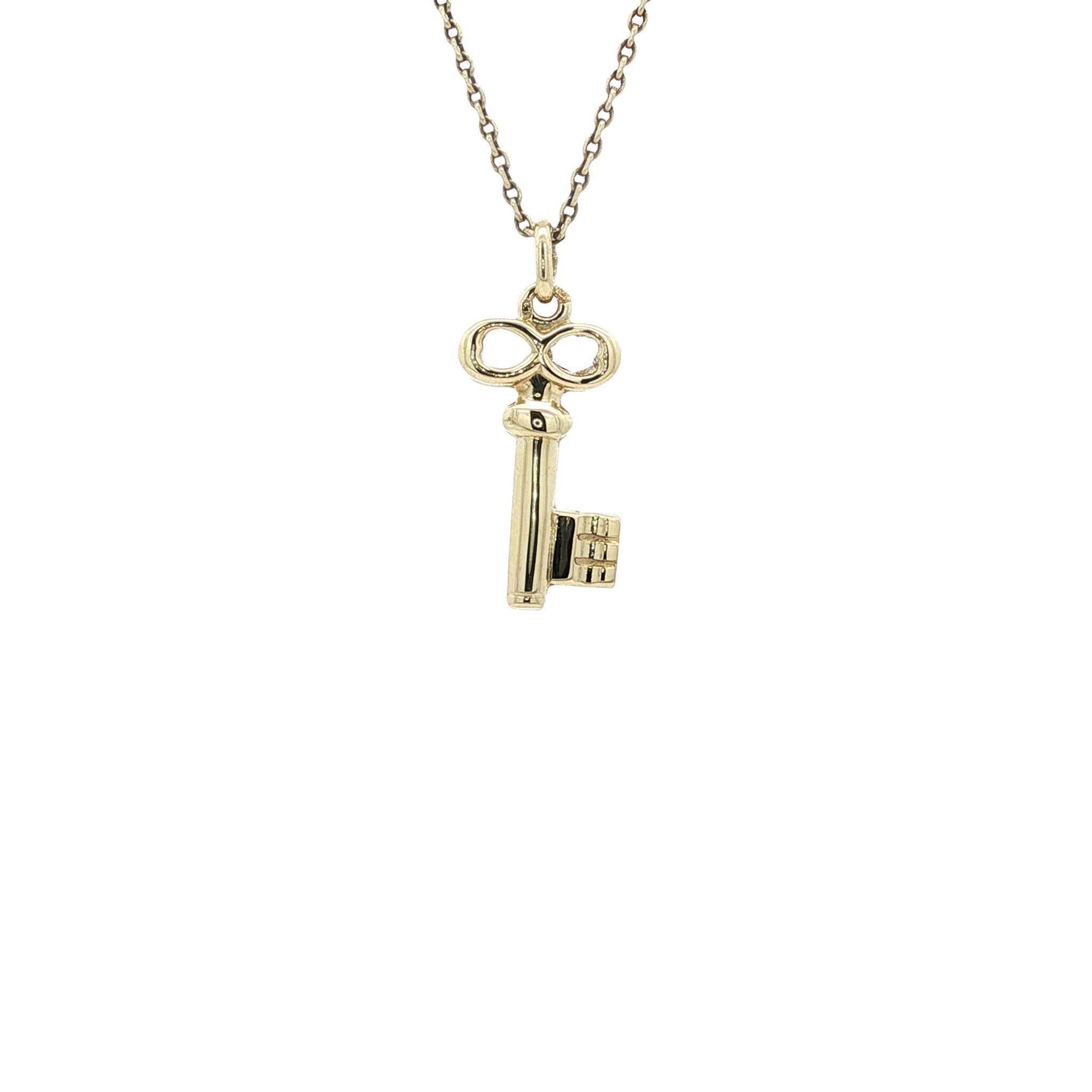 Gold key pendant 14 karat