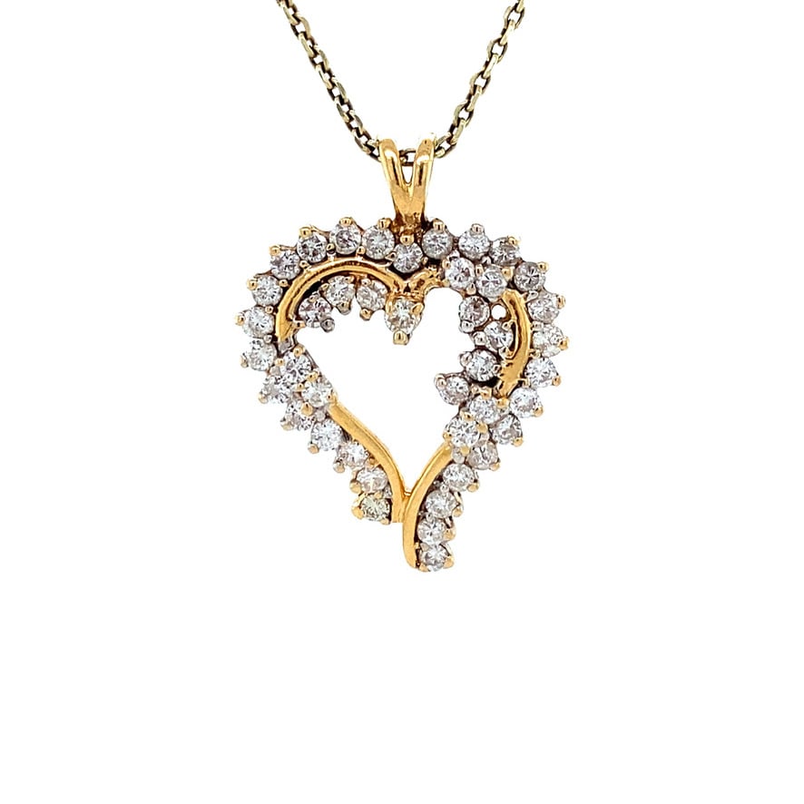 Golden heart pendant with diamond 18 kt