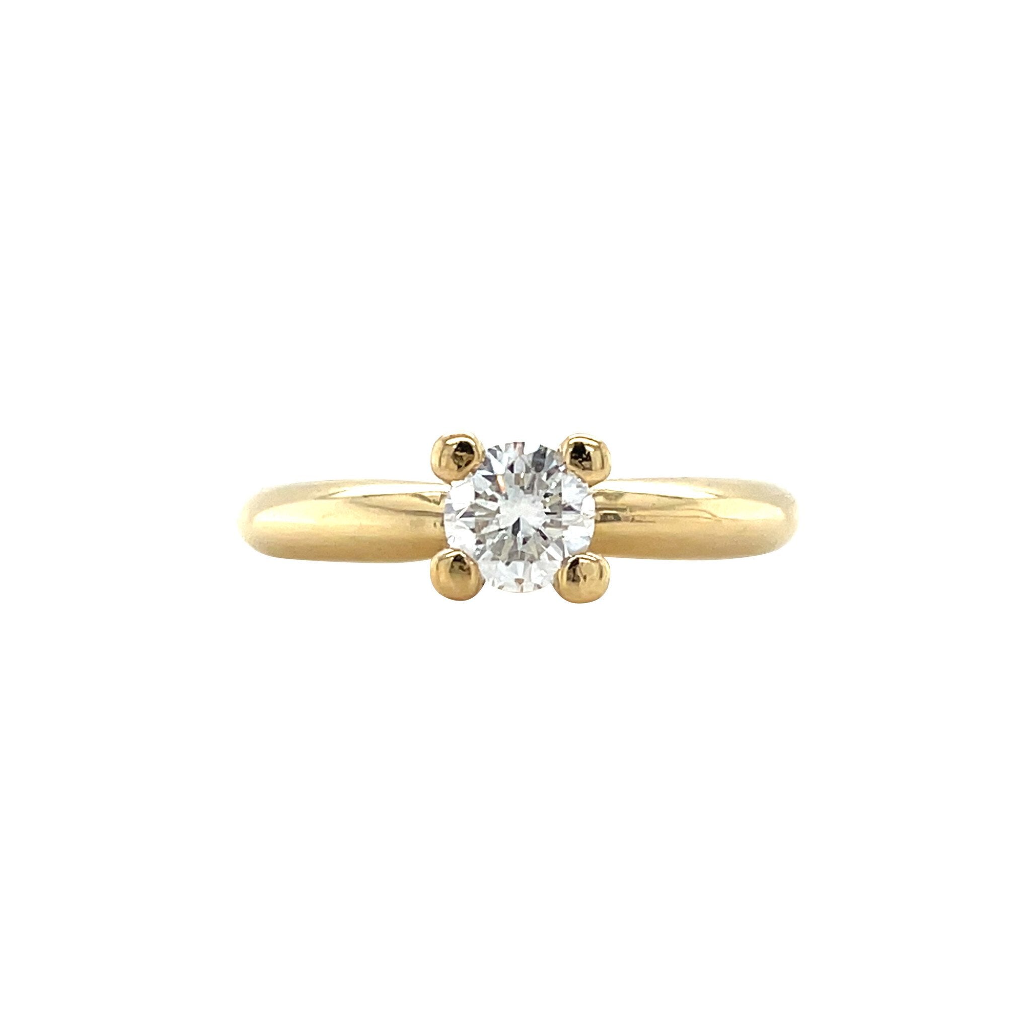Gold solitaire ring with diamond 18 karat