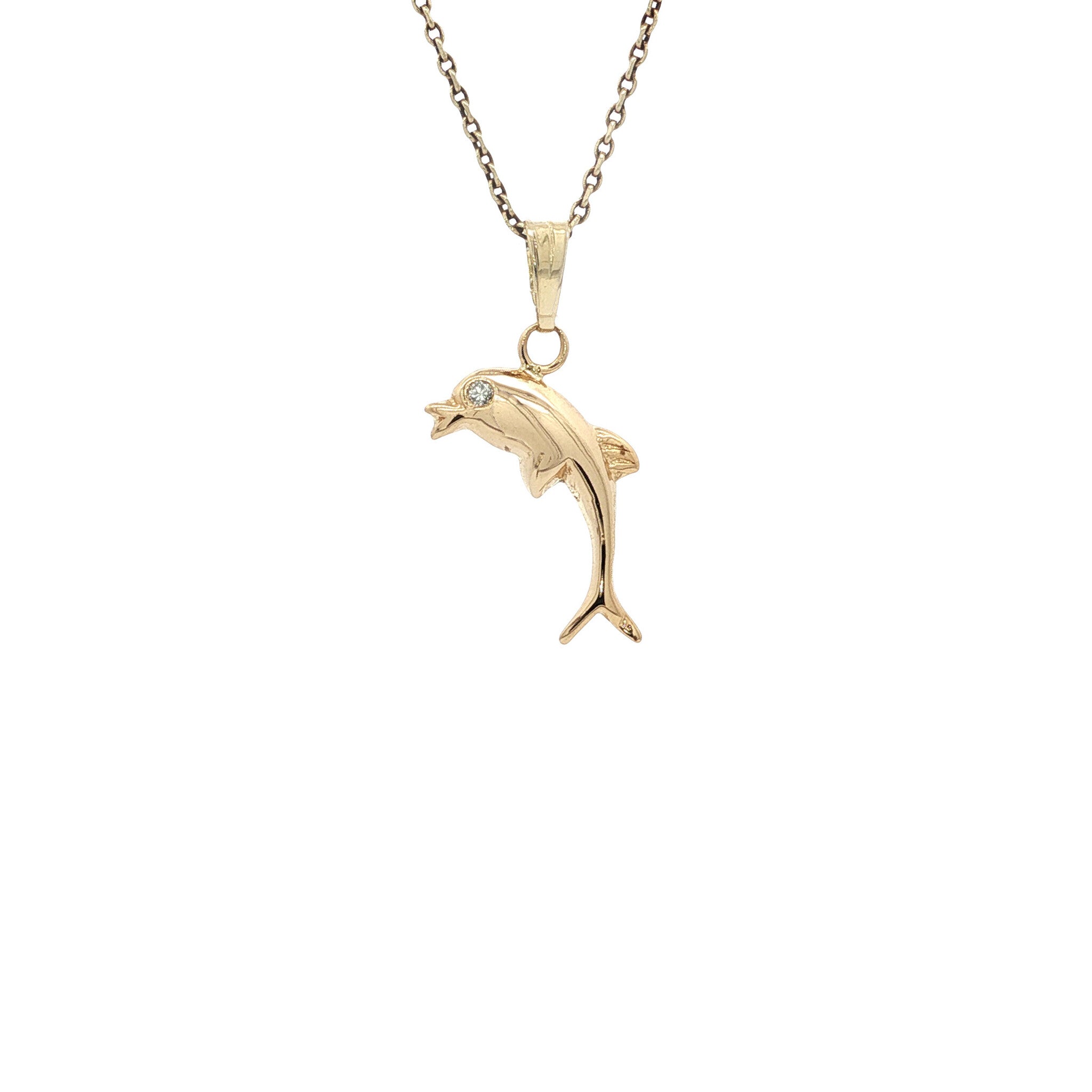 Gold dolphin pendant with 14 karat diamond