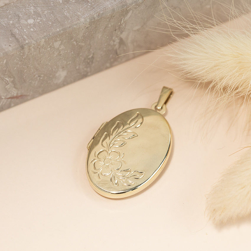 Golden medallion with engraving 14 karat