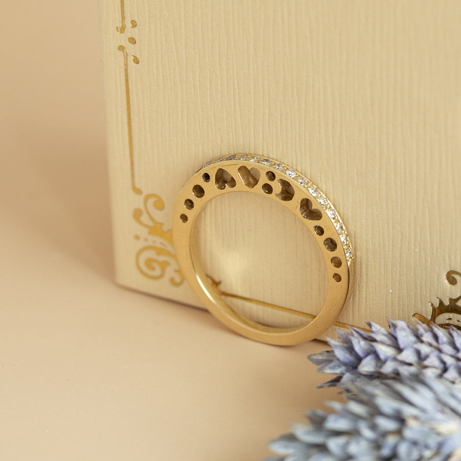 Gold row ring with diamond 18 karat