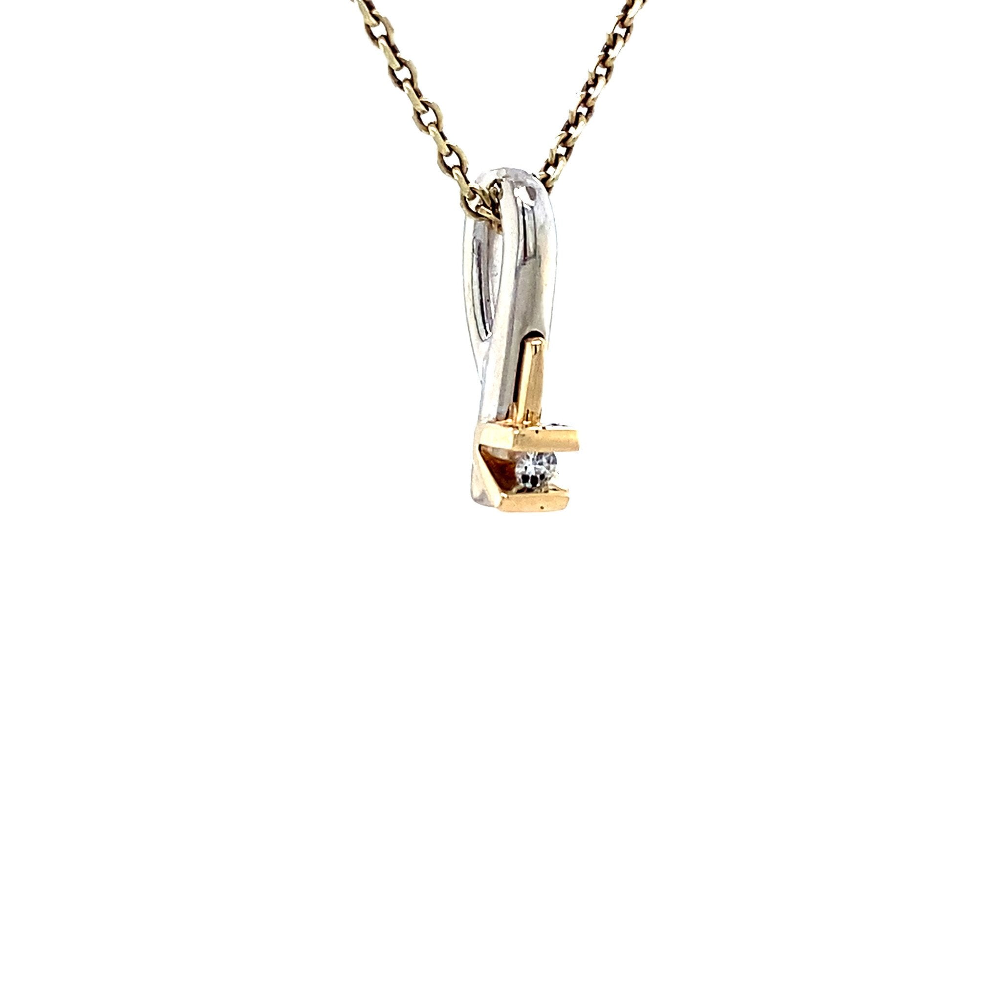 White gold pendant with diamond in 14 karat yellow gold
