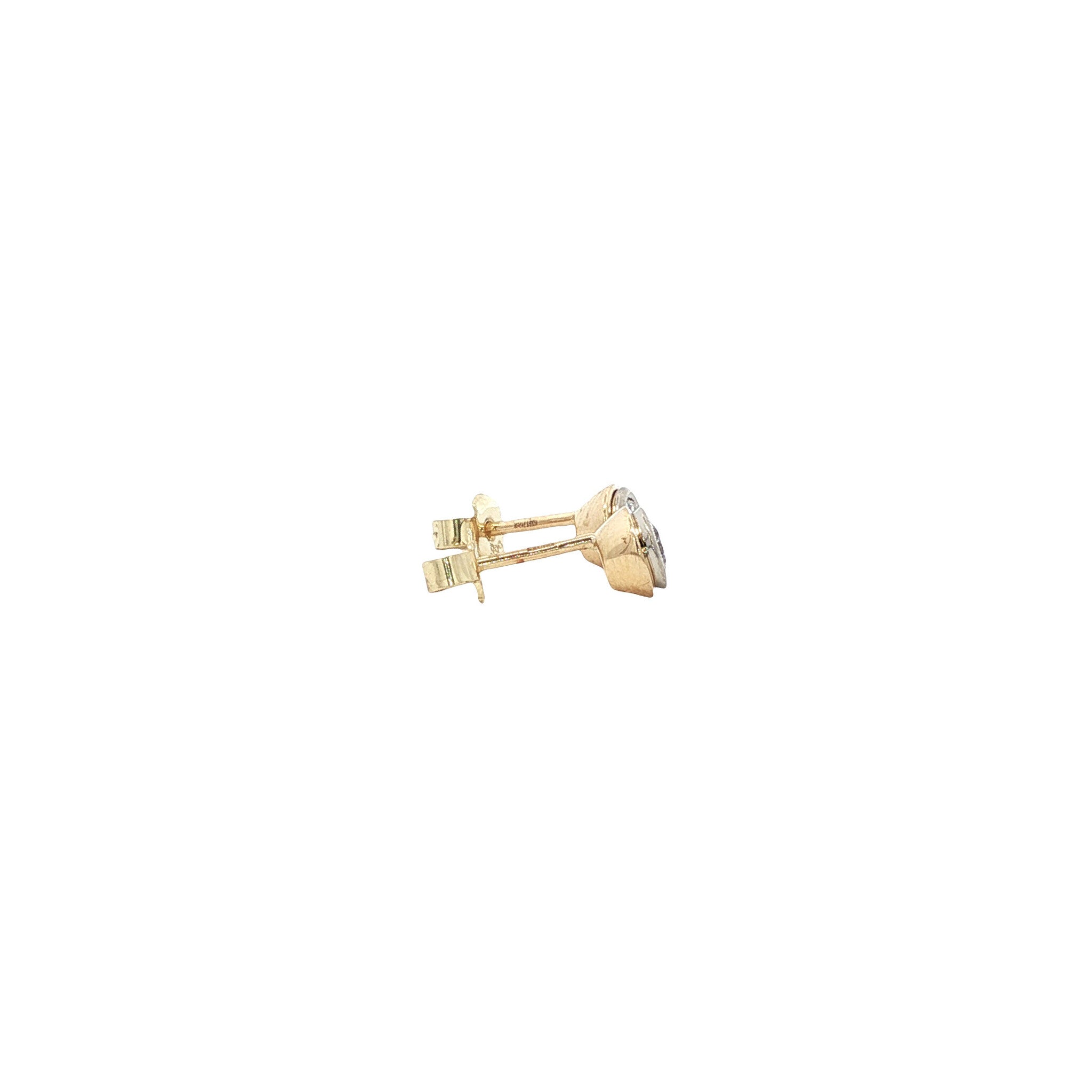 Solitaire diamond stud earrings in 14 karat gold.