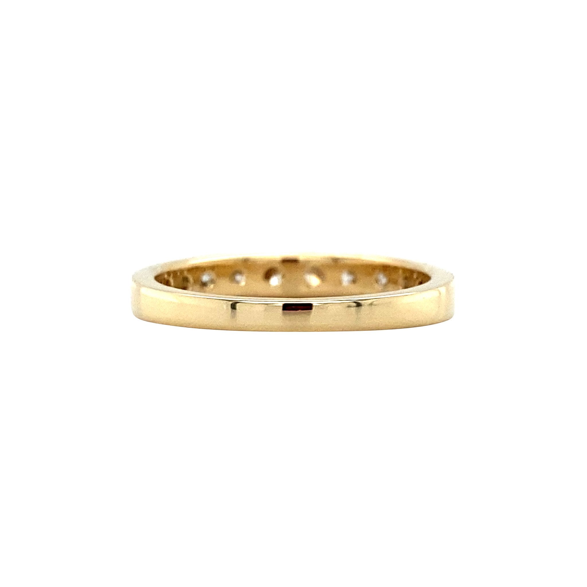 Gold row ring with diamond 14 karat