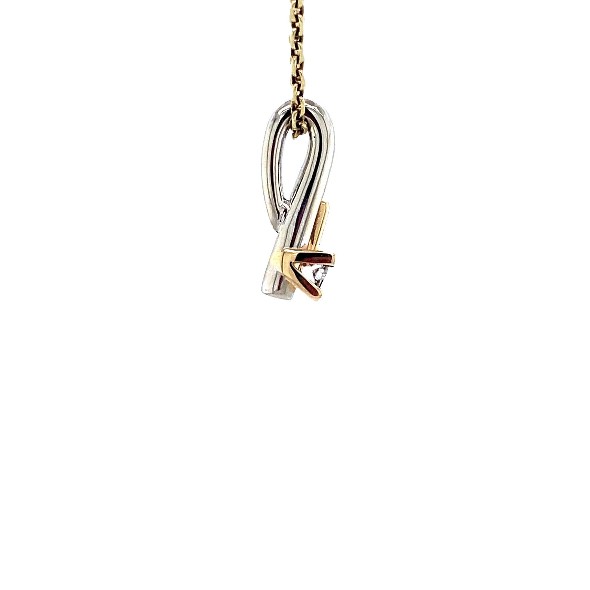 White gold pendant with diamond in 14 karat yellow gold