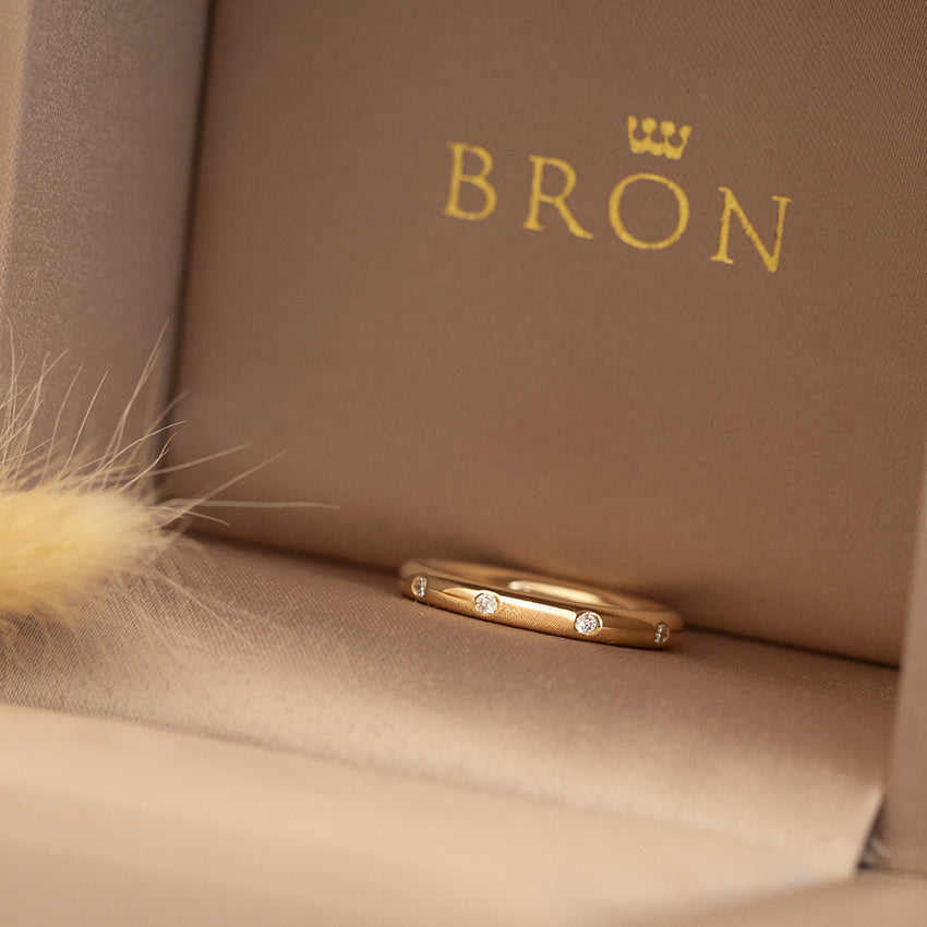 Golden stax ring with diamond from Bron Jewelry 18 karat