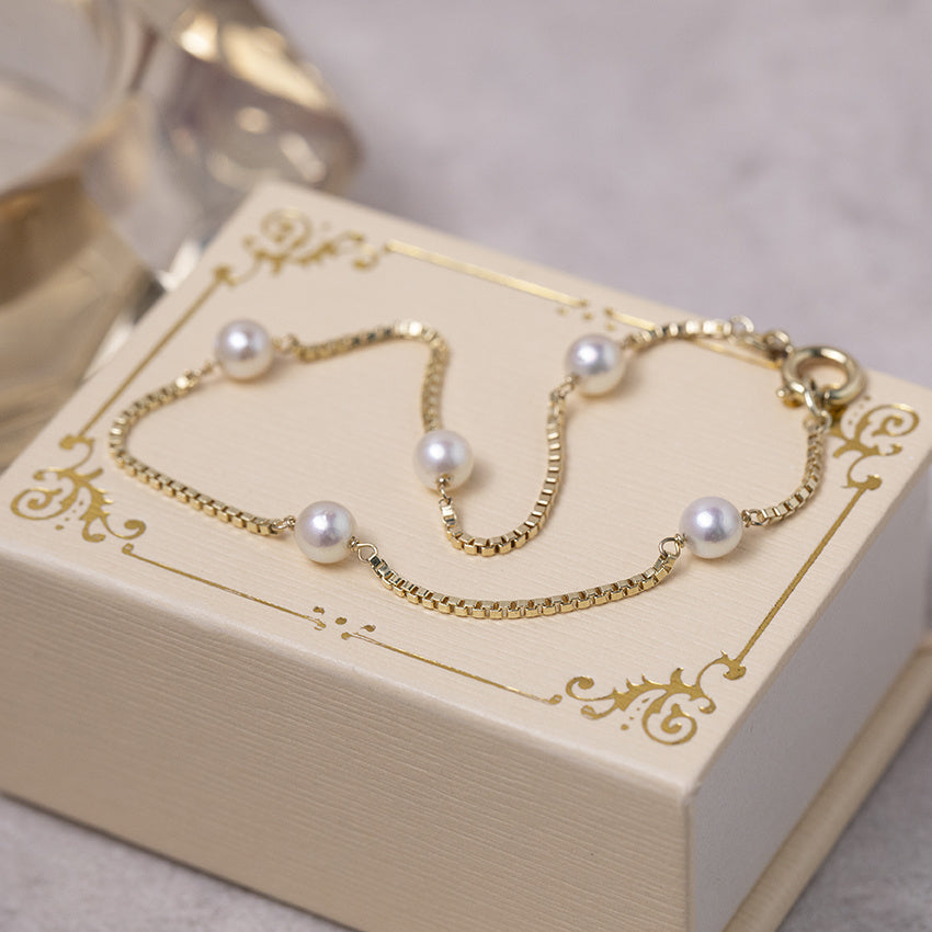 Gouden armband met parels 14 karaat