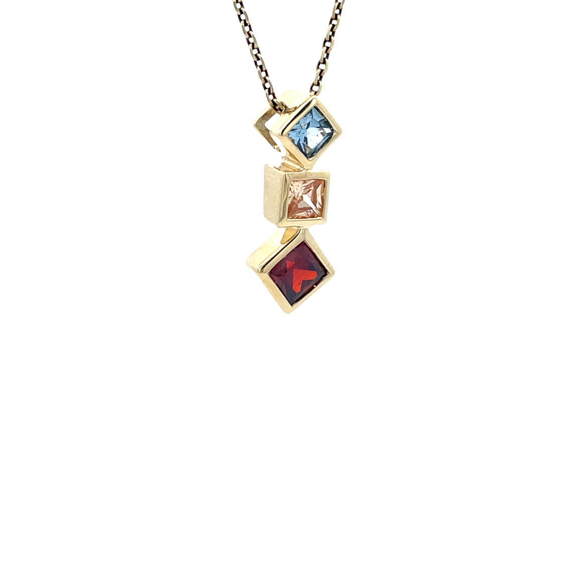 14 karat gold pendant with colored stone