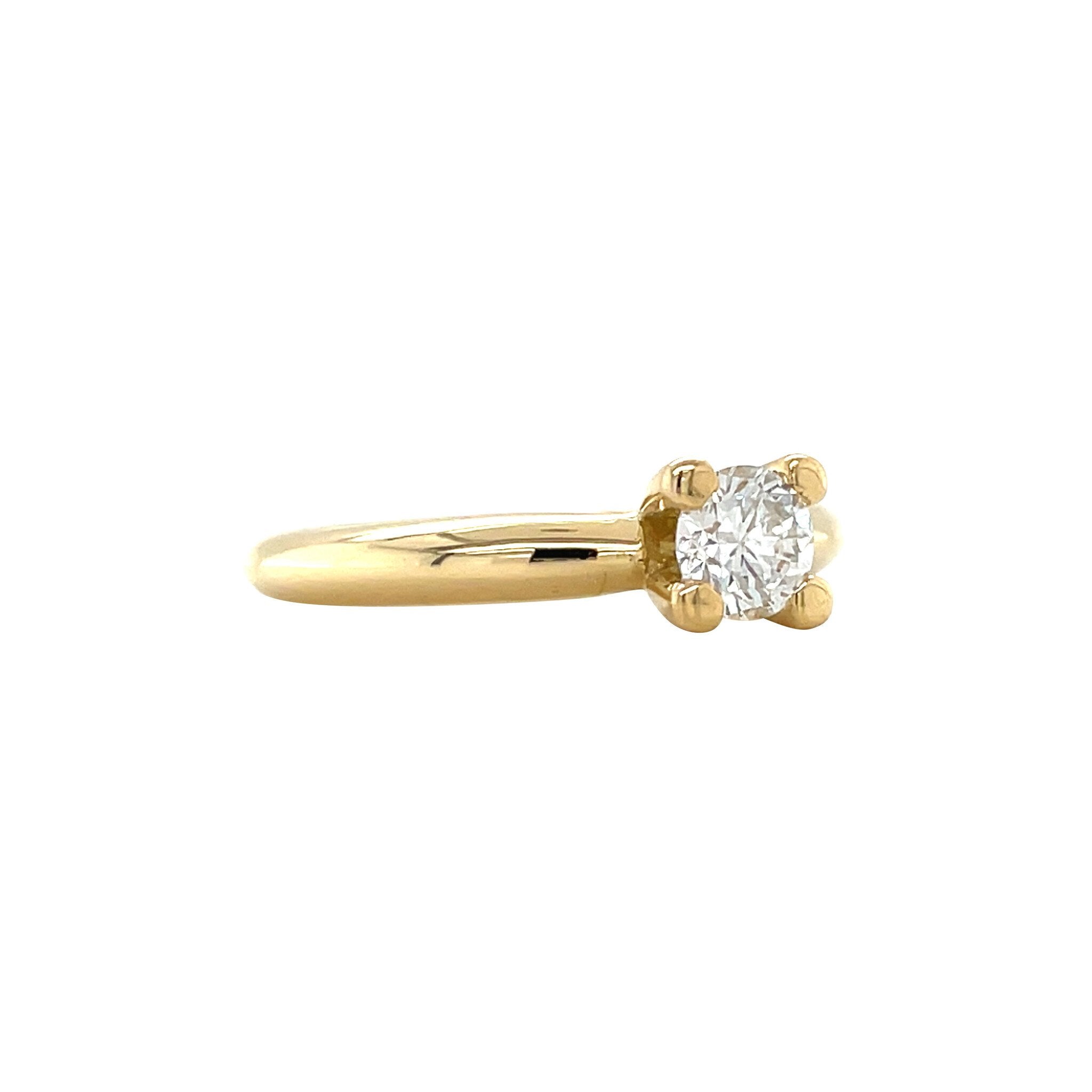 Gold solitaire ring with diamond 18 karat