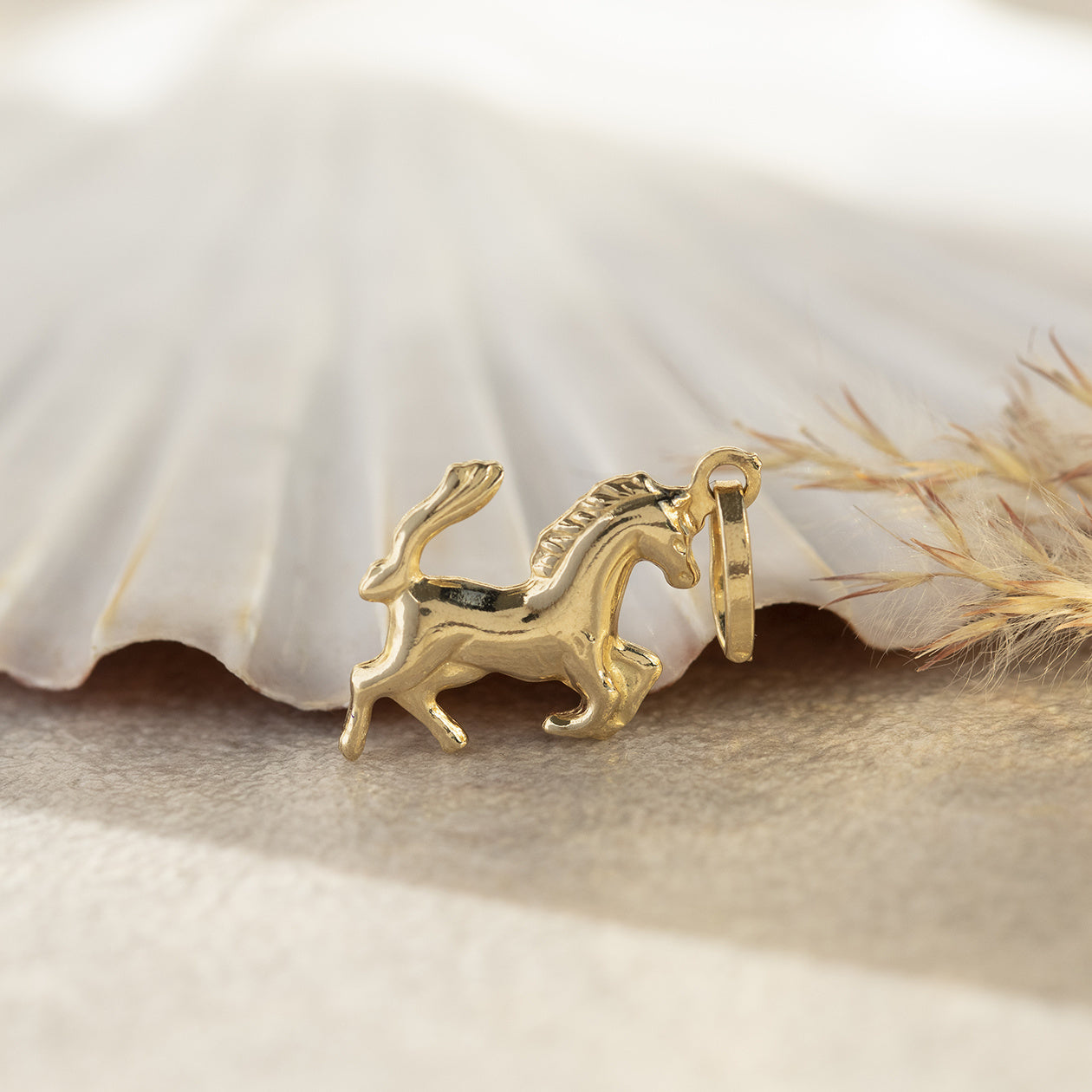 Gold horse pendant 14 kt