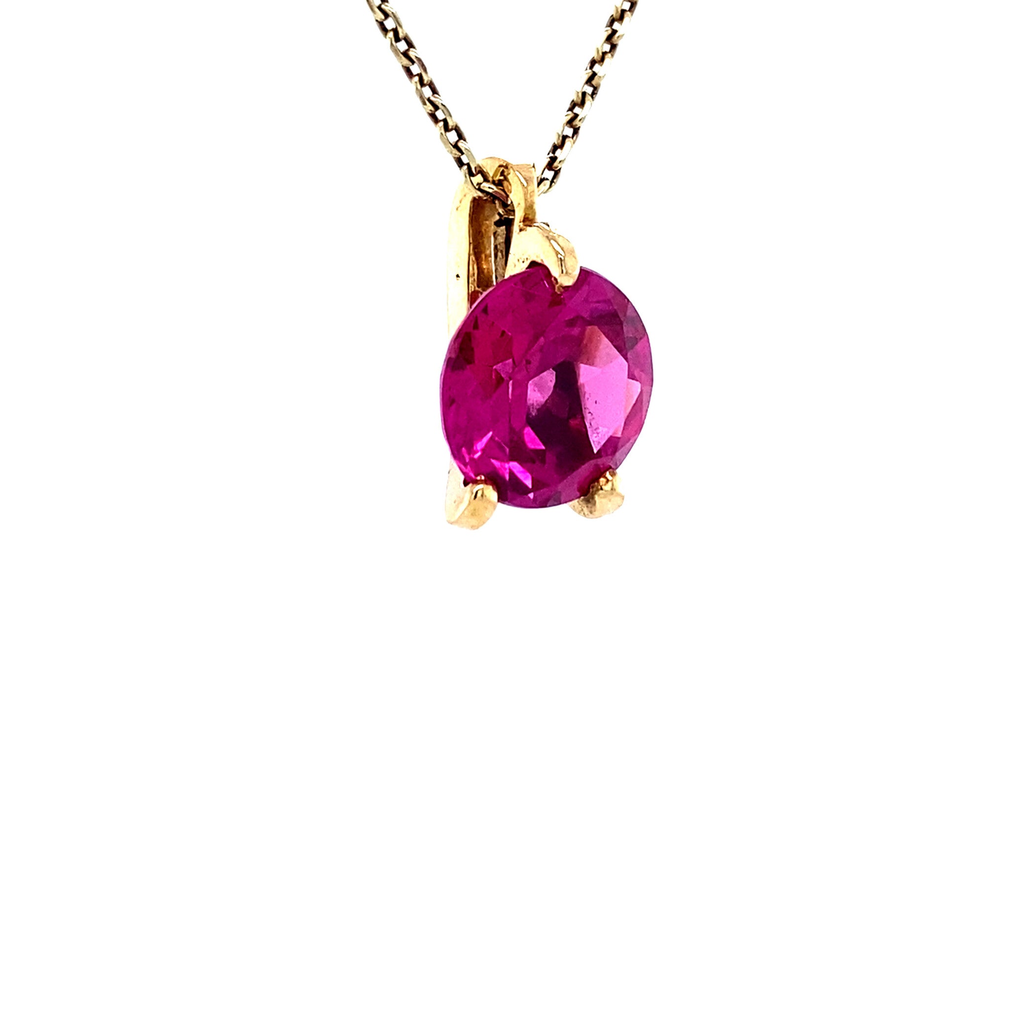 14 karat gold pendant with pink gemstone