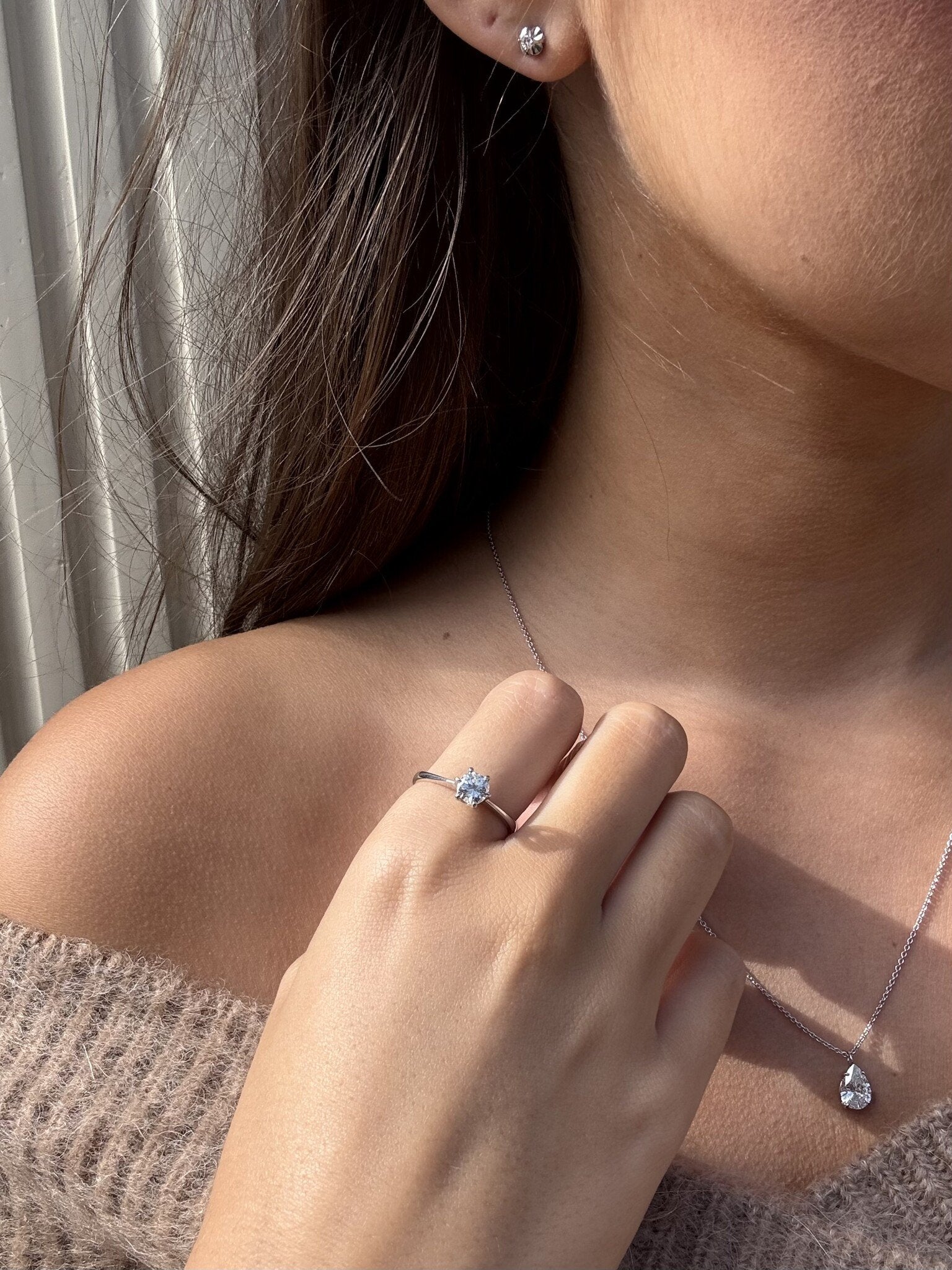 White gold solitaire ear studs with diamond 14 karat