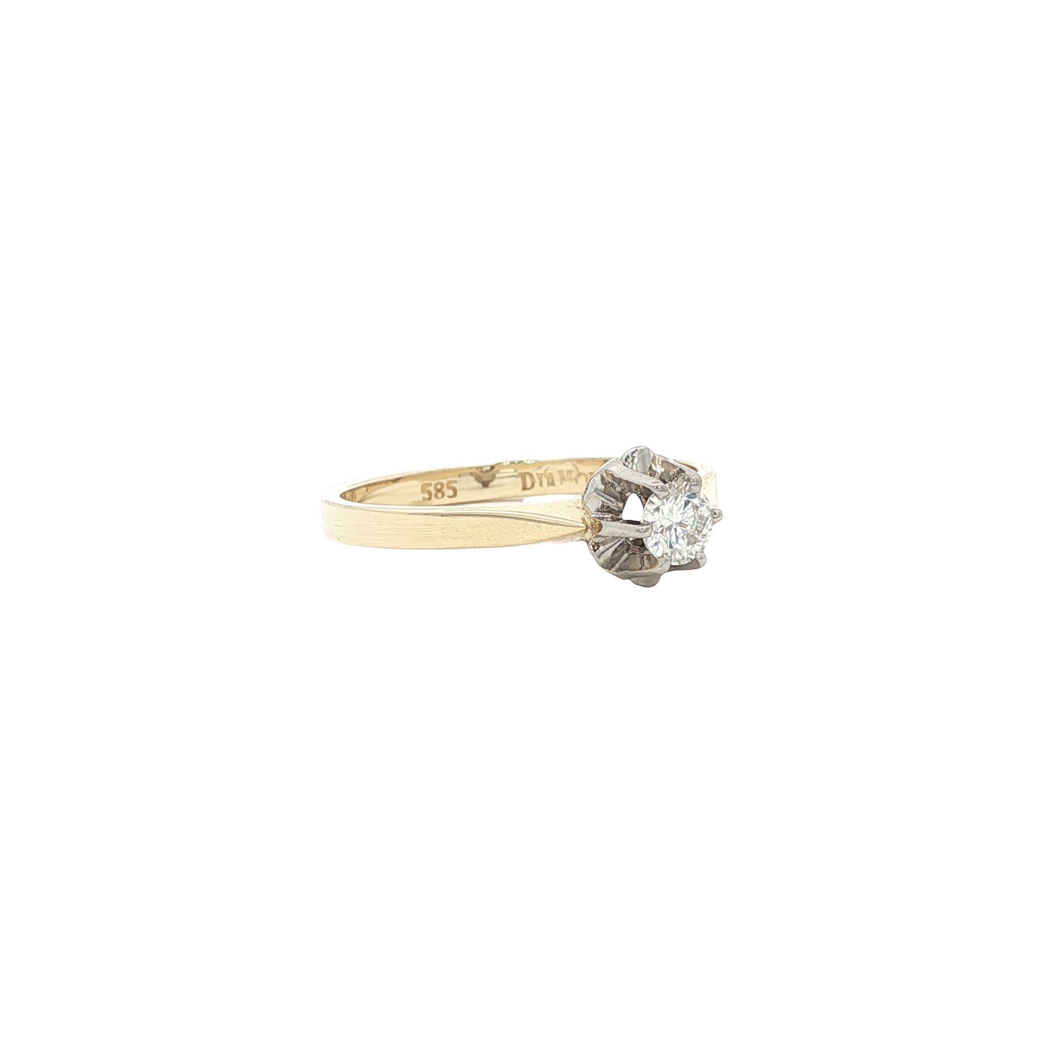 14 karat gold solitaire ring with a diamond
