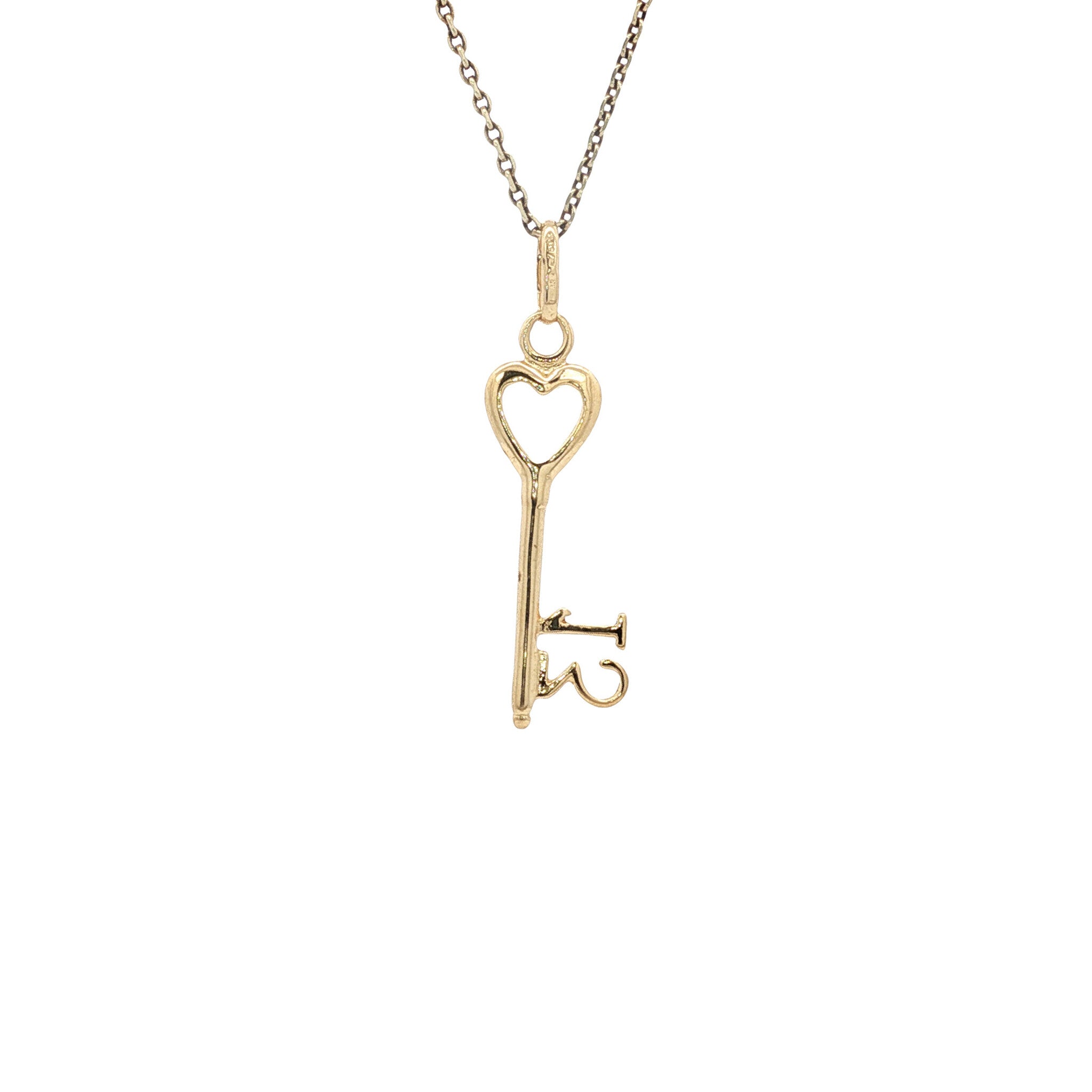 Gold key pendant 18 karat