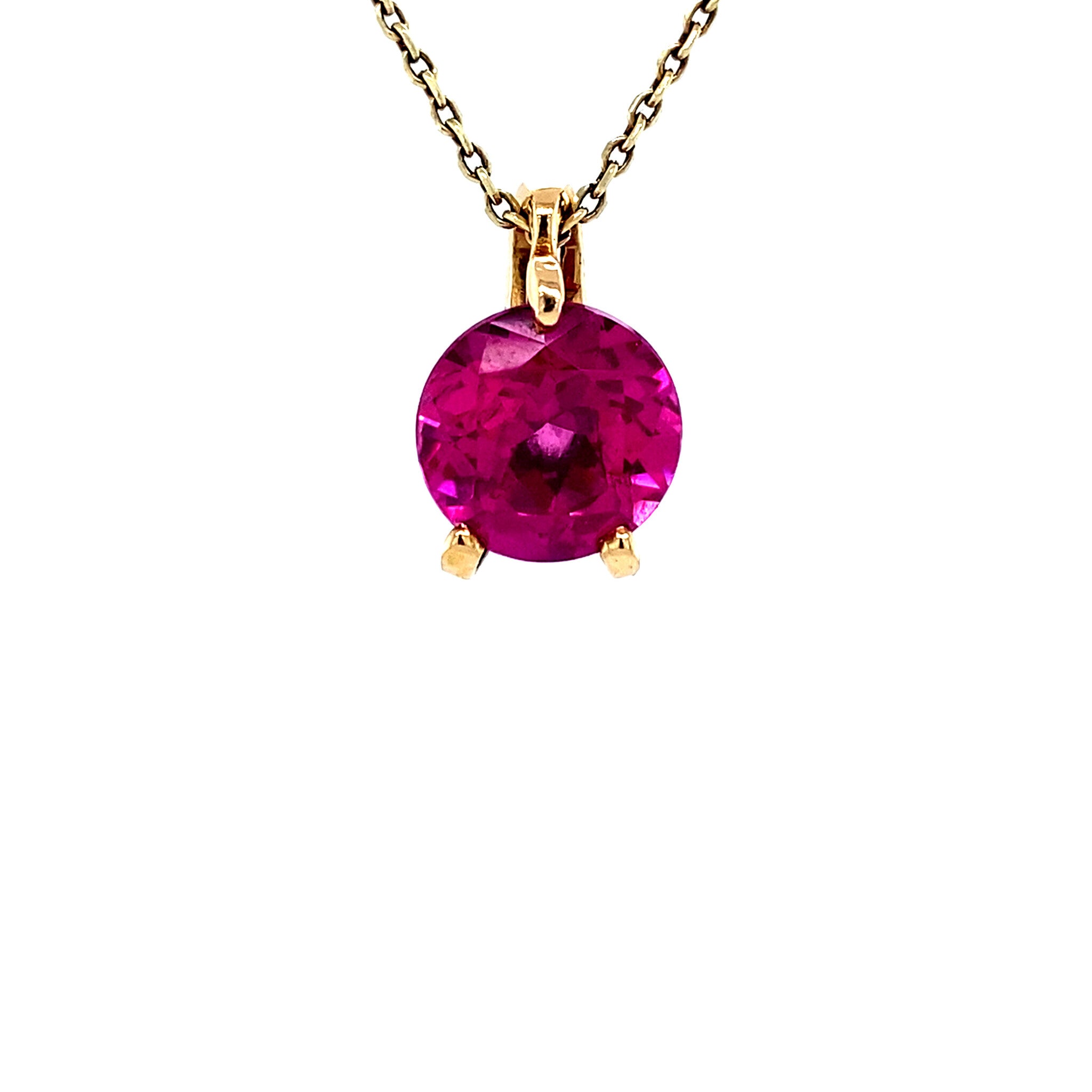 14 karat gold pendant with pink gemstone