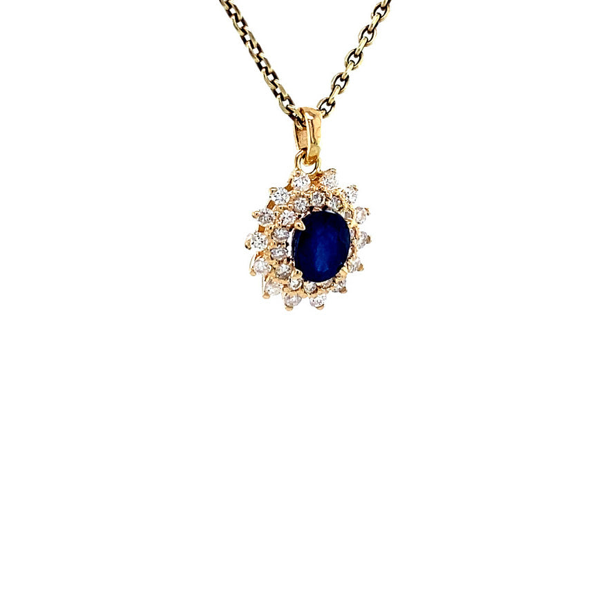 Gold entourage pendant with diamond and sapphire 14 karat* New