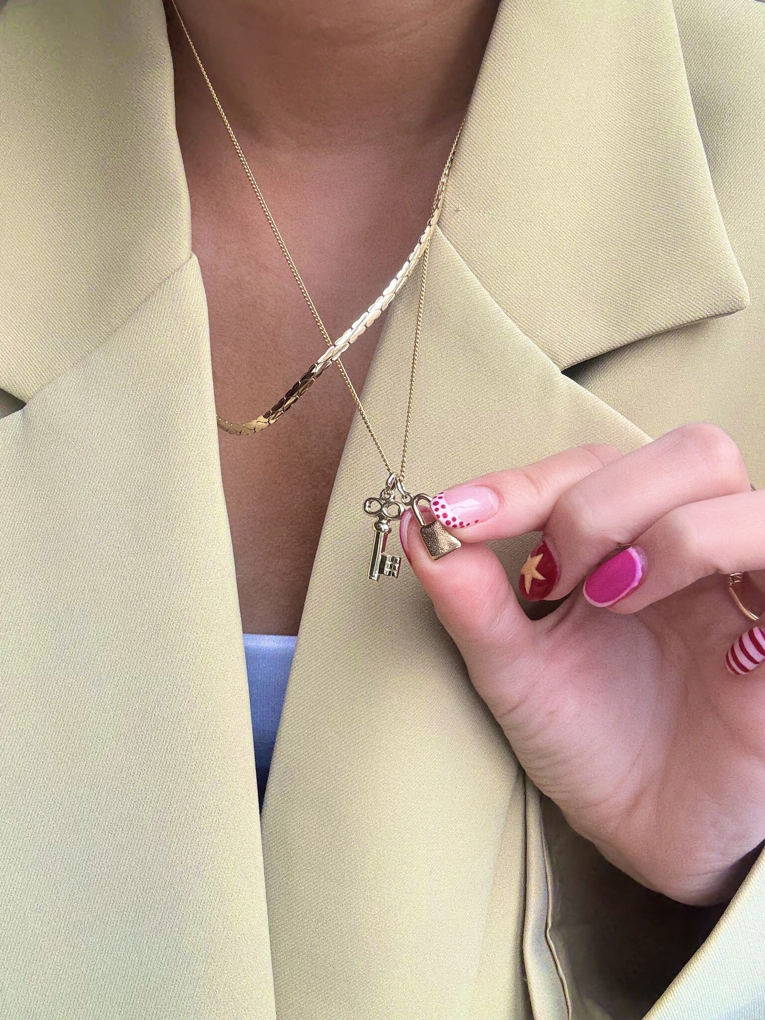 Gold key pendant 14 karat