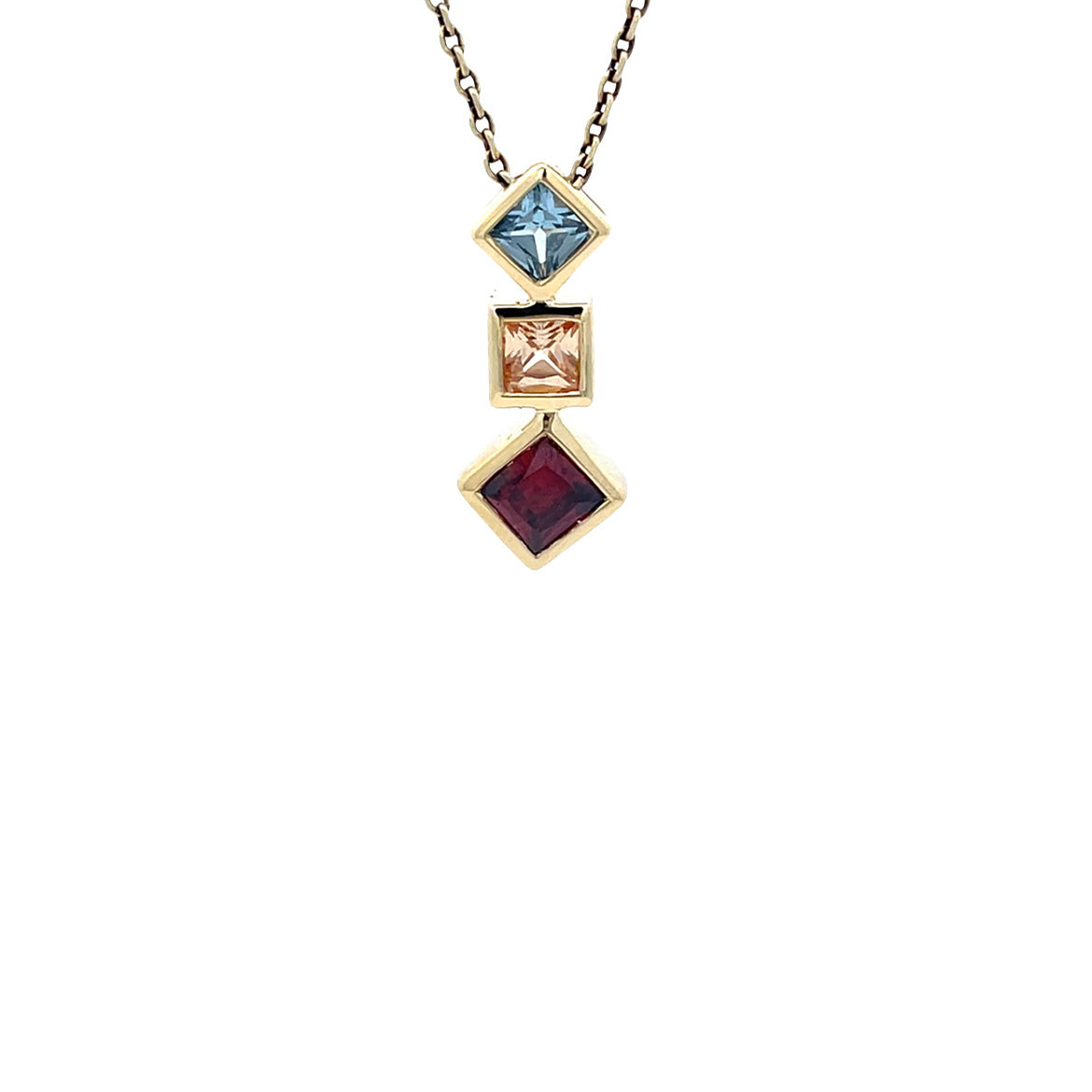 14 karat gold pendant with colored stone