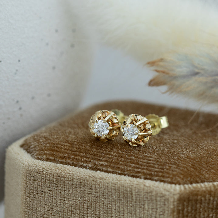 Gold solitaire stud earrings with diamond 14 karat