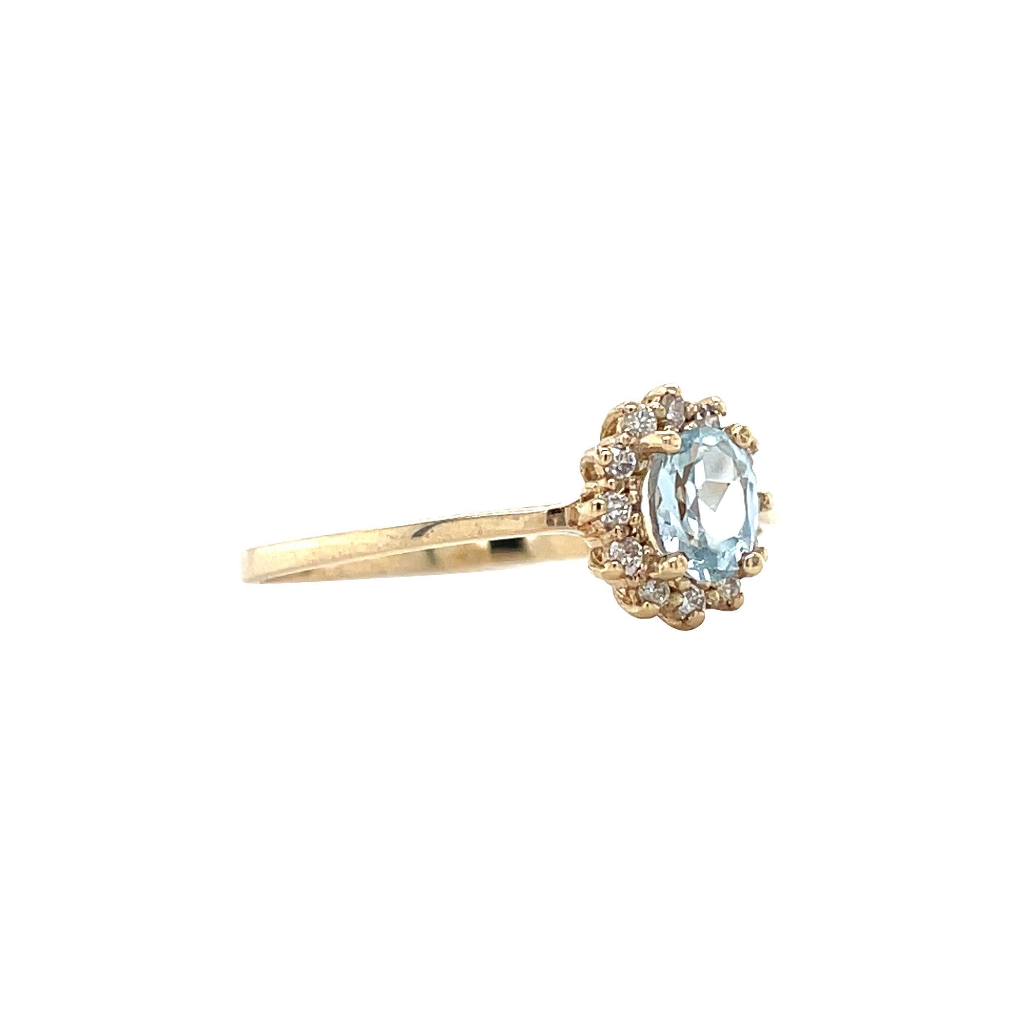 Gouden entourage ring met topaas en diamant 14 karaat* nieuw