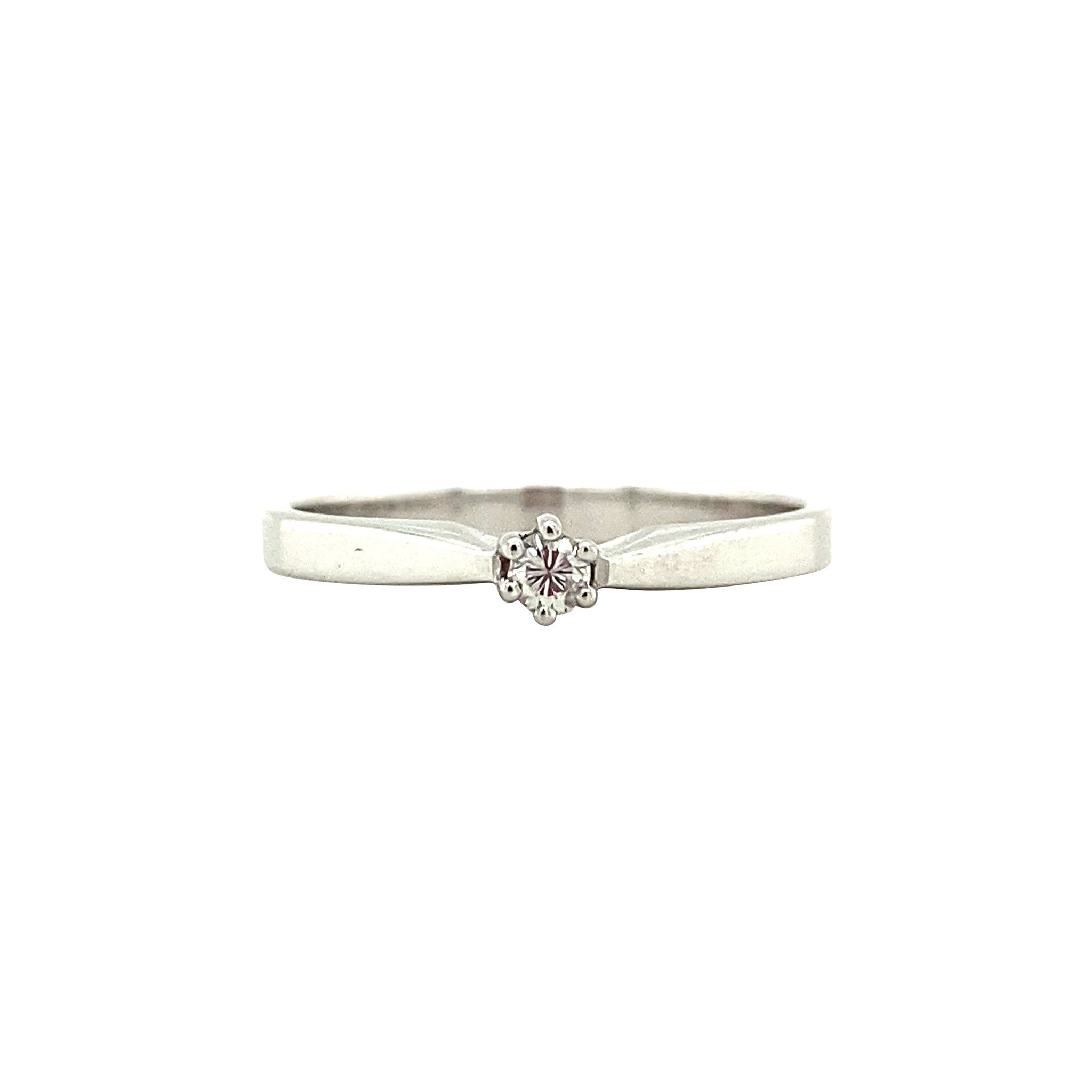 White-gold solitaire ring with diamond 14 kt* new
