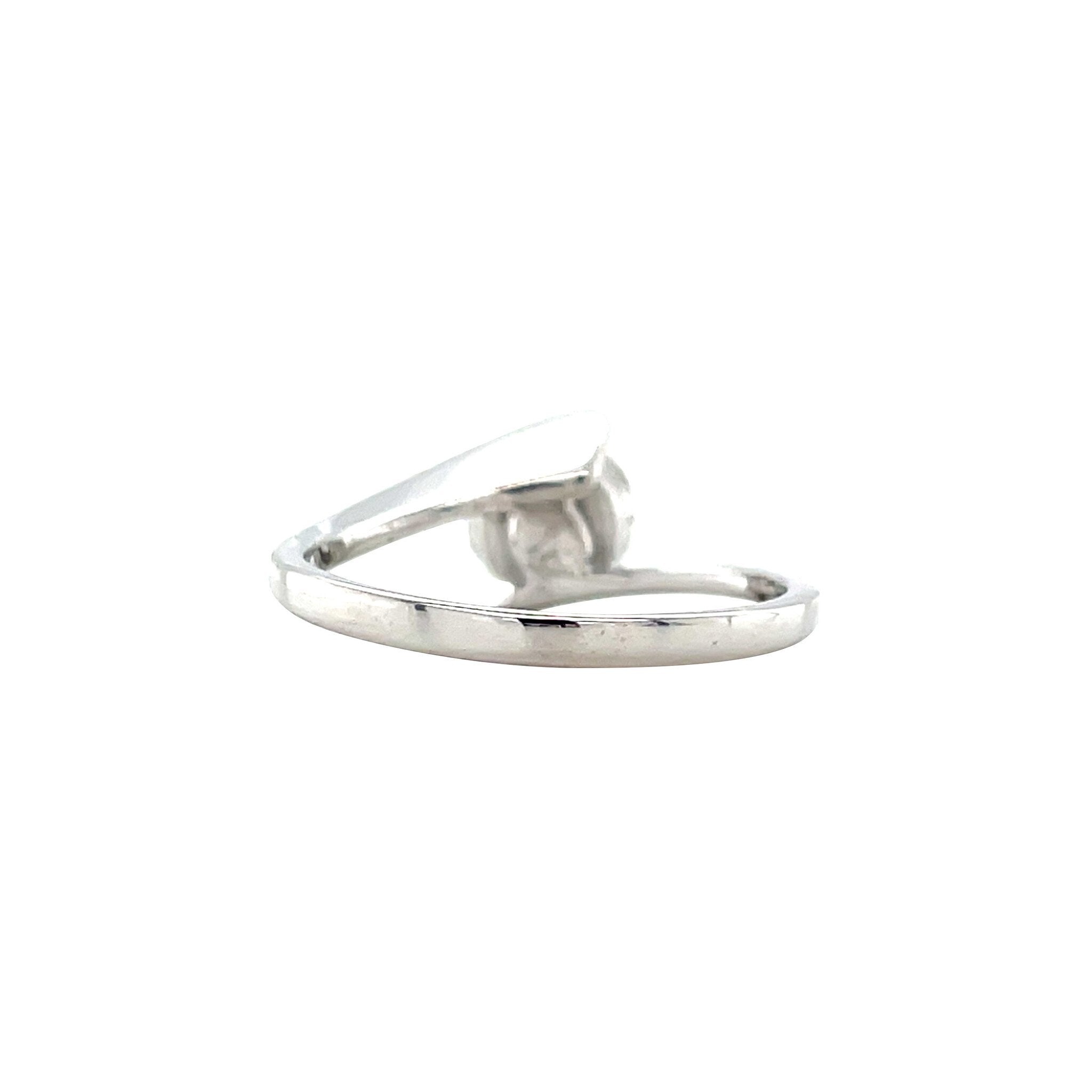 White gold hammered ring with diamond 18 karat