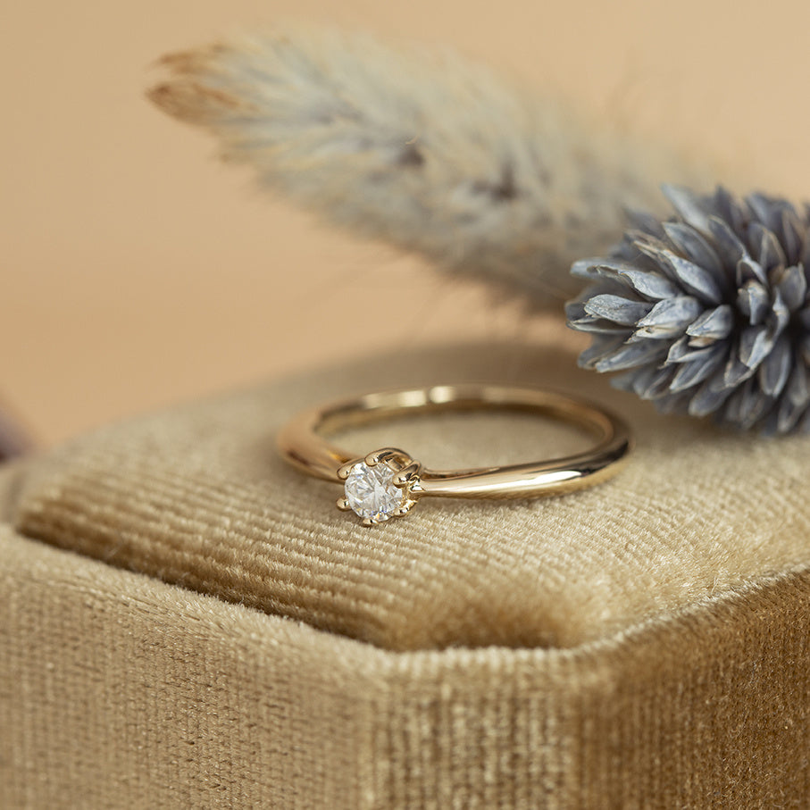 Gouden solitair ring met diamant 14 karaat