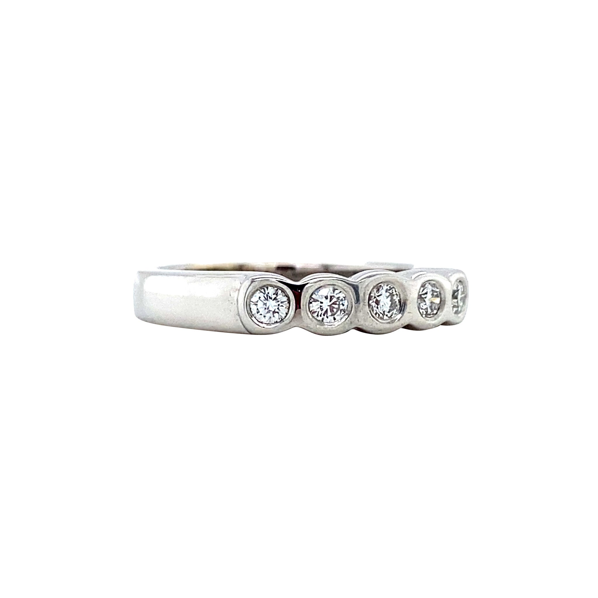 White gold row ring with diamond 18 karat