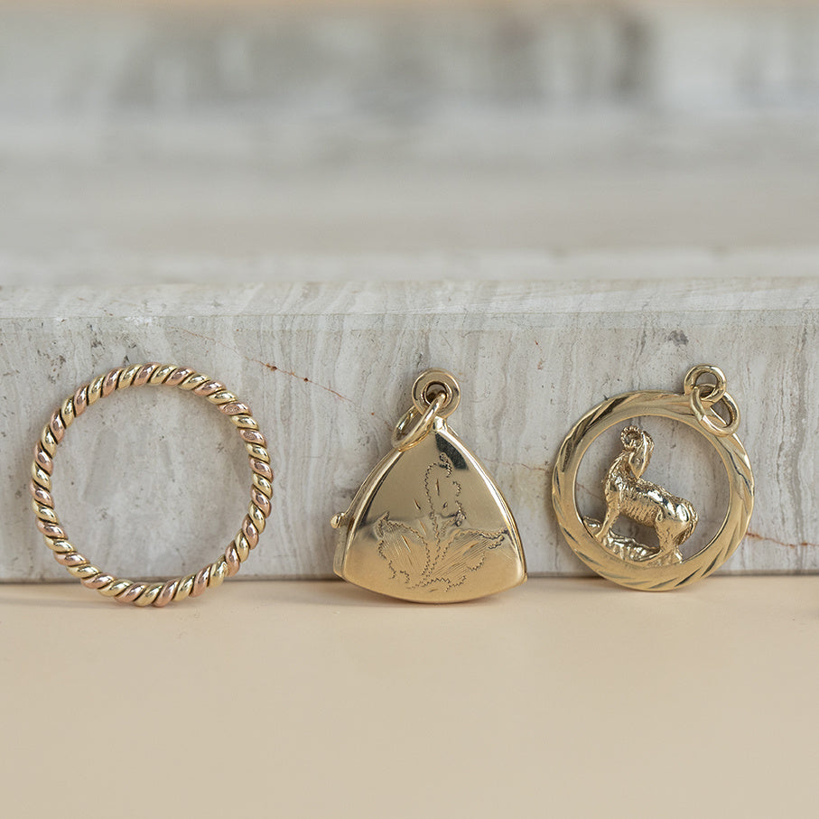 Gold medallion pendant 14 karat