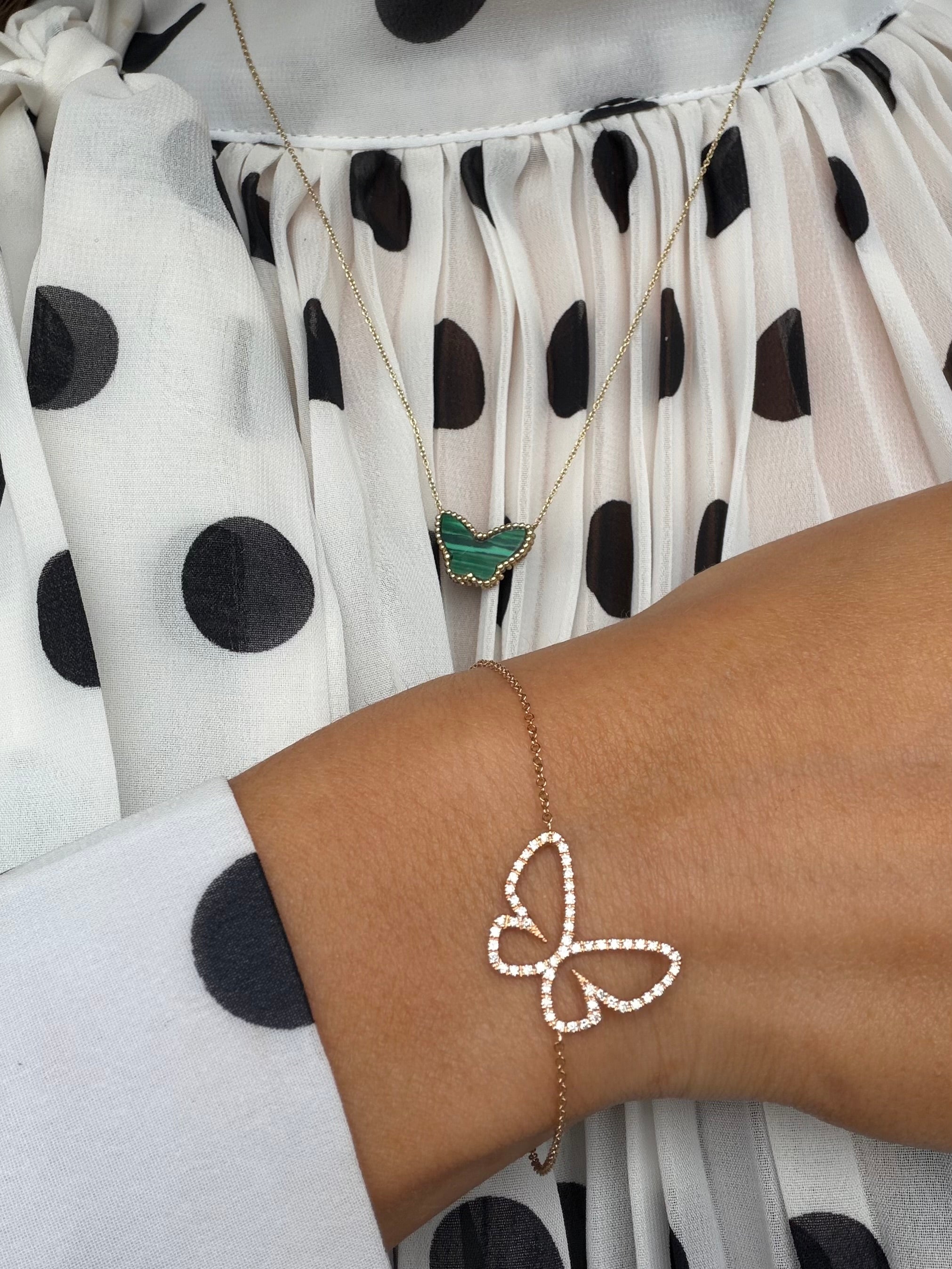 Gouden choker met malachiet vlinder 14 karaat