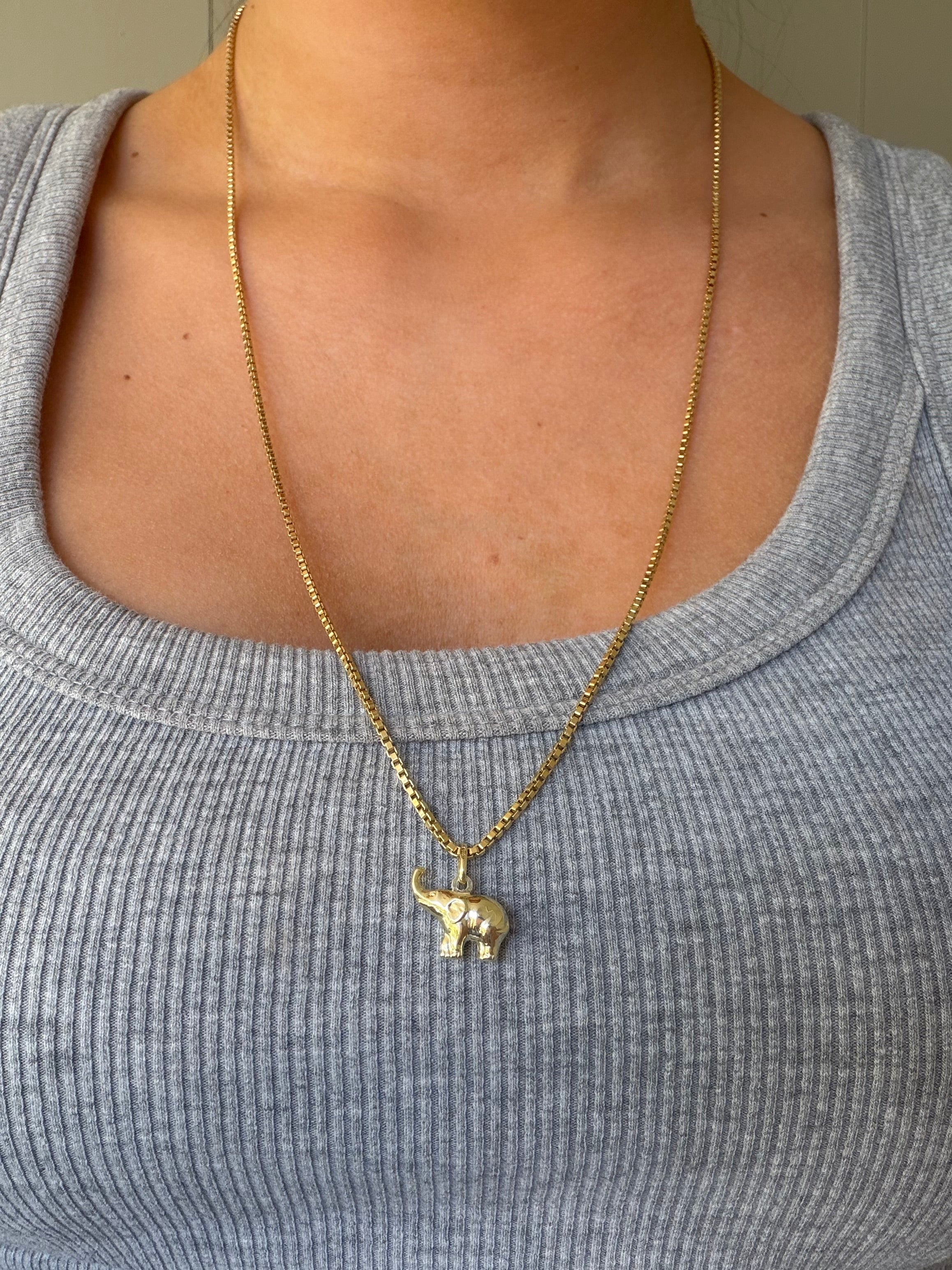 14-karat gold elephant pendant