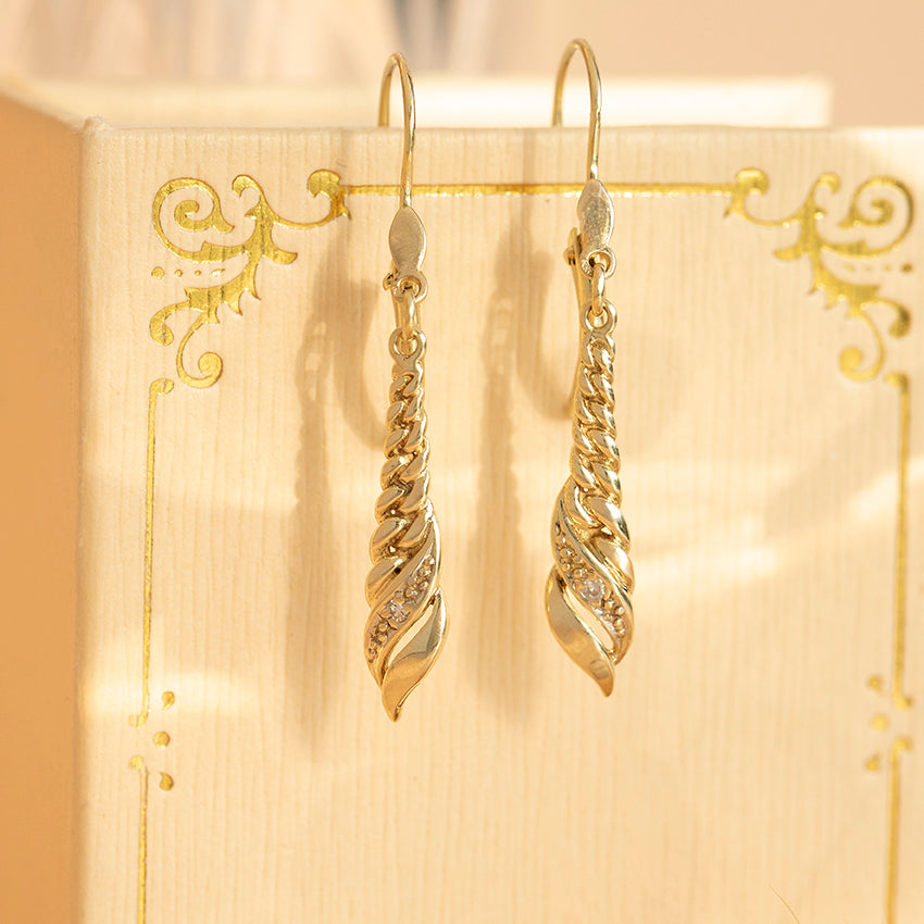 14 karat gold earrings with diamond