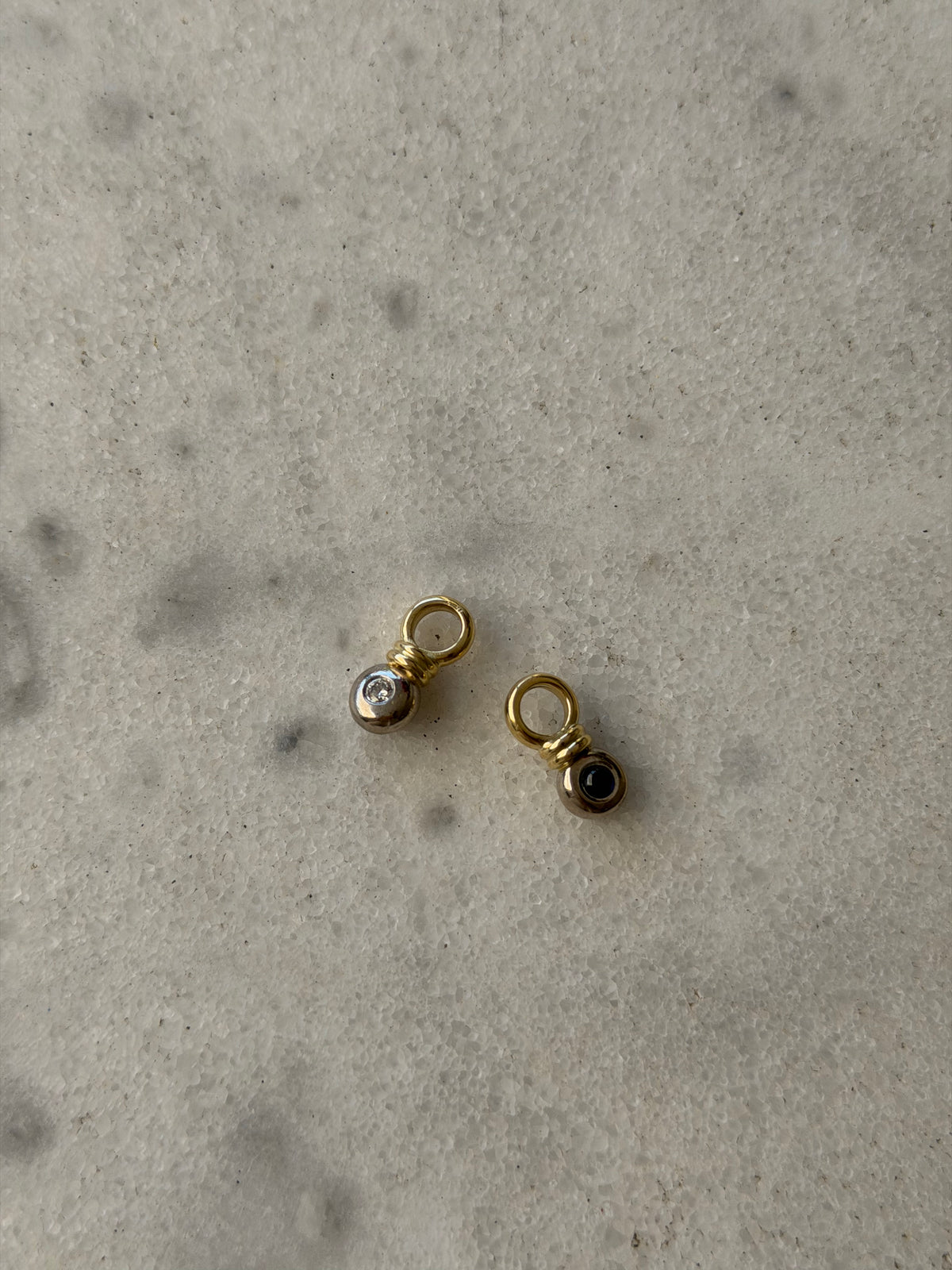 14-karat gold pendants with sapphire and diamond